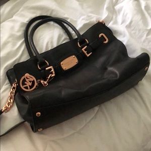 Black and rose gold purse price negotiable